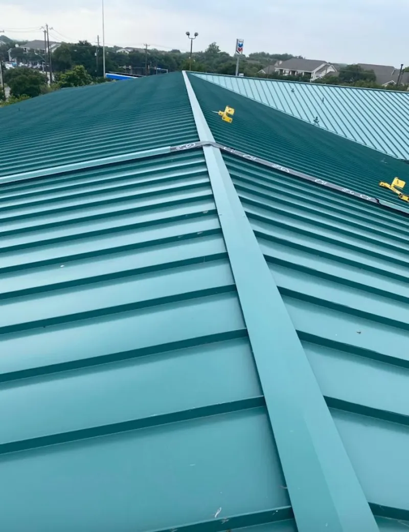 Green commercial metal roof ridge and valley for Metal Roof Repair in Malverne
