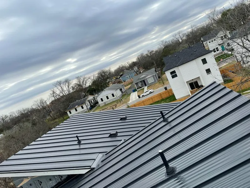 Standing seam metal roof panels with vents for Skylight Repair in Malverne